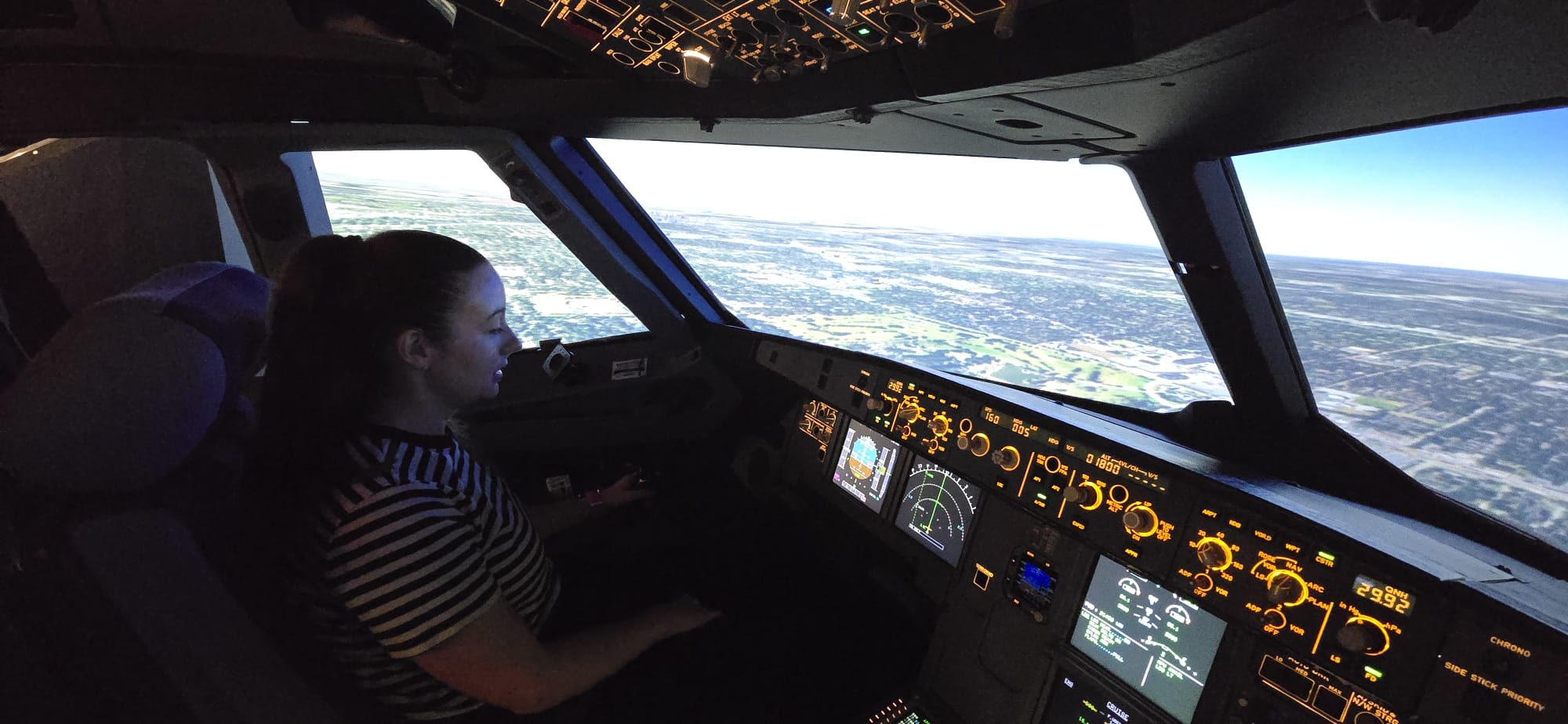 Guest at the controls flying over the Florida landscape