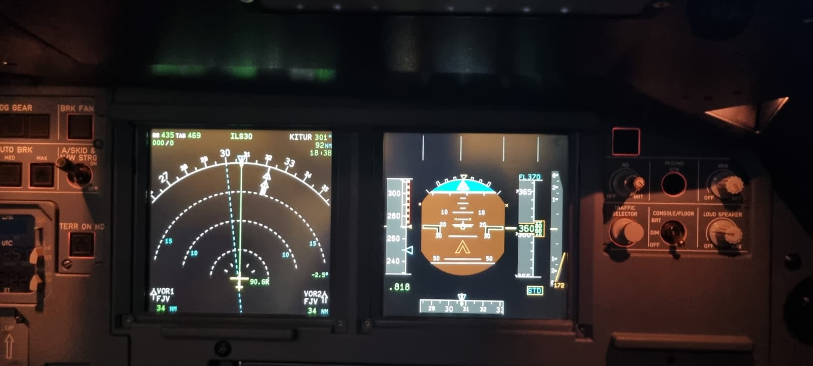 Airbus A320 primary flight display lit up on the flight deck